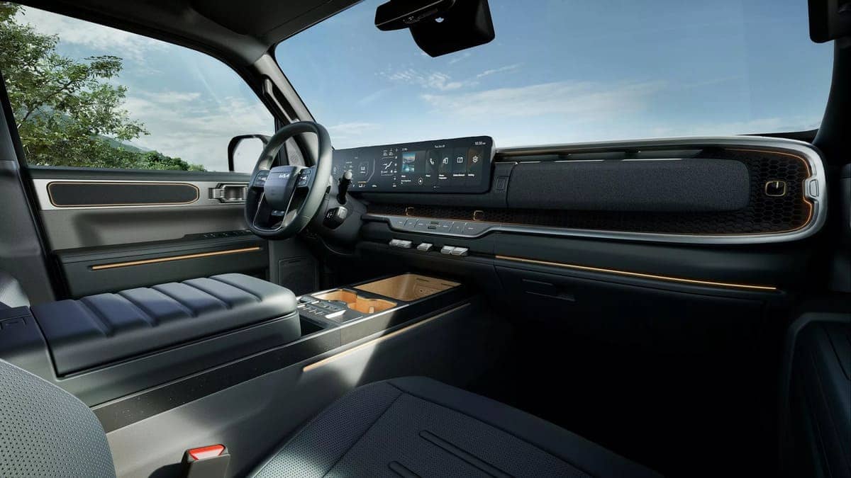 Kia se Prepara para Desafiar al Toyota Prado con el Tasman SUV 7 Tasman SUV espacio delantero